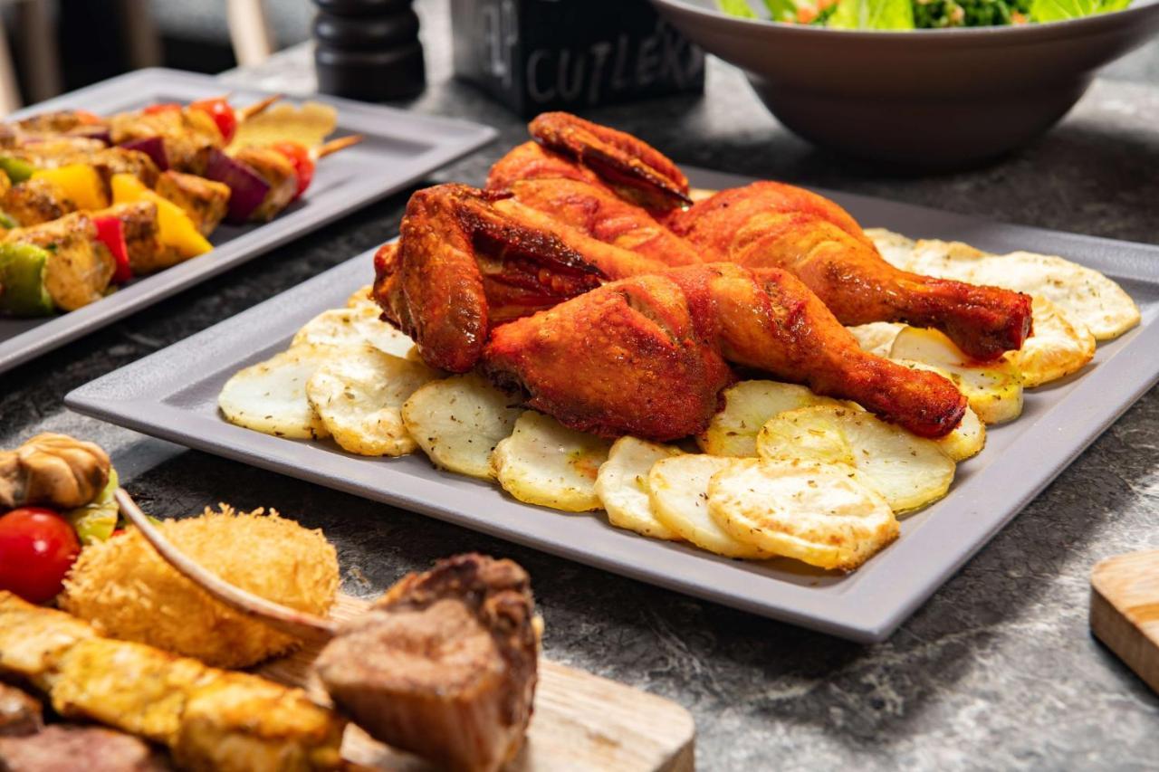 Park Inn By Radisson Makkah Aziziyah Mecca Luaran gambar A plate of chicken pakora