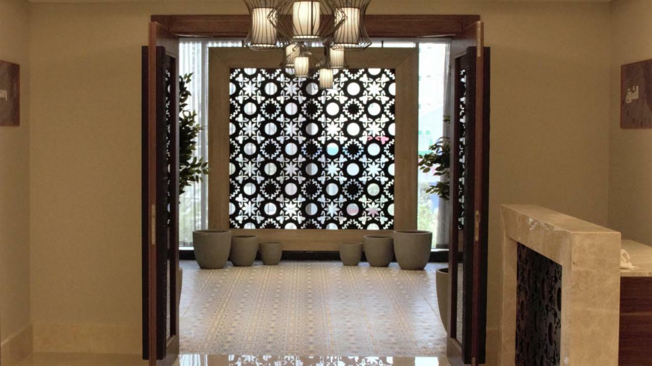 Park Inn By Radisson Makkah Aziziyah Mecca Luaran gambar A decorative panel of glass